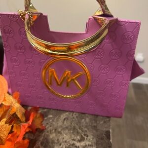 Michael Kors Pink MK Embossed Tote with Gold Accent